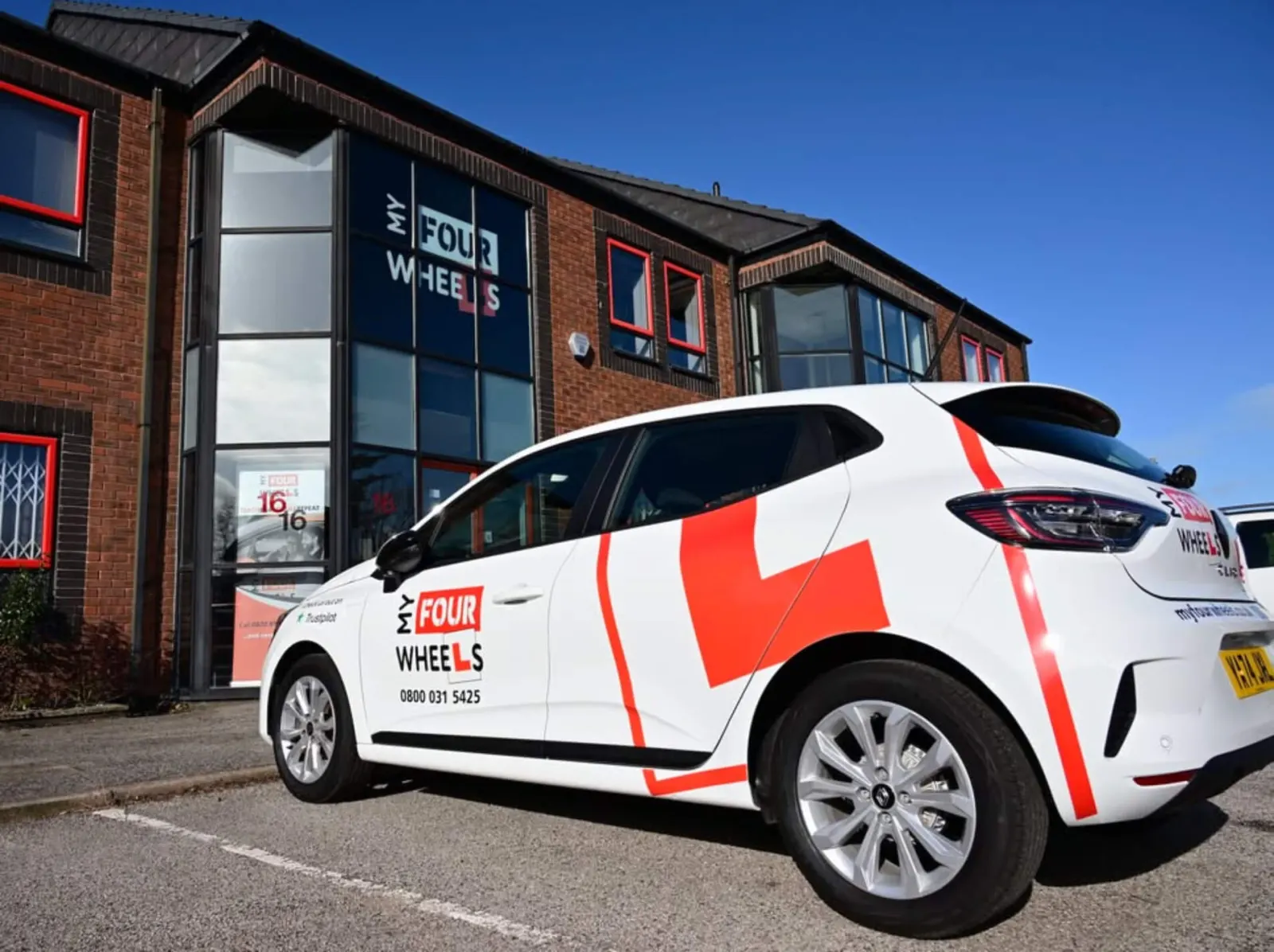 A My Four Wheels lesson car outside the head office